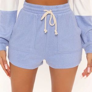 Fashion nova weekend in Malibu French terry shorts soft light blue tie string